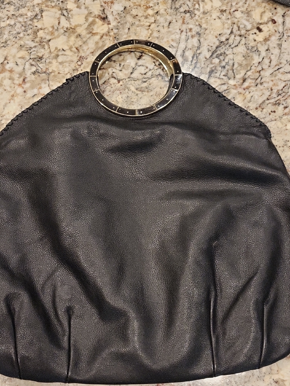 Black Pebbled Leather Handbag With Silver Ring Handles